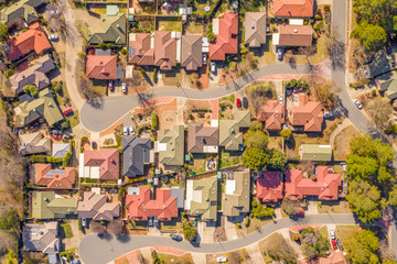Aerial view of streets and rooftops in the suburb of Holt in Canberra, Australia