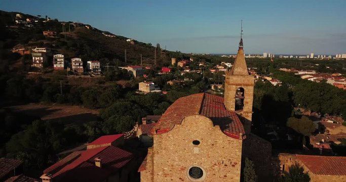 The old Spanish town of Castel de Aro and the Catholic Church