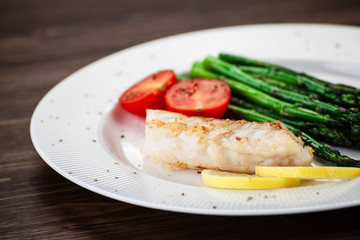 Fish dish - fried fish fillet and vegetables