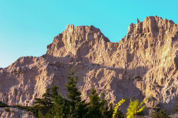 Blue Skies behind Badlands mountians