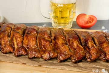 Pork ribs marinated baked in the oven. Pork on the grill. BBQ.
