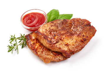 Fried juicy pork steak, isolated on white background