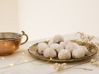 Pastries with tea cup on the table