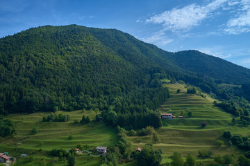 Fototapeta na wymiar Aerial photography. Panoramic view of the Alps north of Italy. Trento Region, San Lorenzo Dorsino. Great trip to the Alps