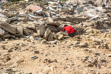 Man is seeking for some treasure after thai tsunami