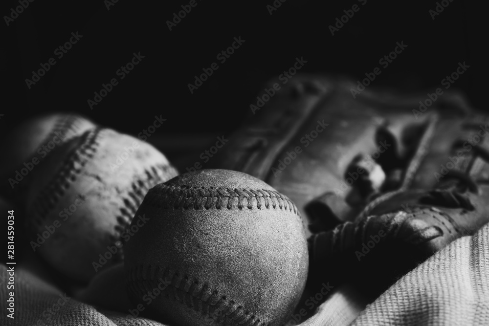 Poster grunge and grit of baseball balls with mitt close up in black and white. - Posters