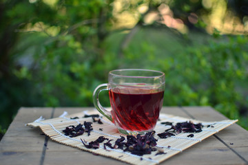 Featured hibiscus flower tea. Concept of health, diet, peace, self love.