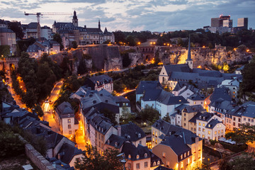The Skyline of Luxembourg City at night.  The Old Town of Luxembourg is a UNESCO World Heritage Site. Neumünster Abbey, the banks of the Alzette River in the lower city, known as the Grund Quarter.