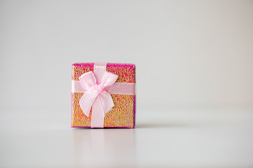 Pink gift box on white background using for happiness festival