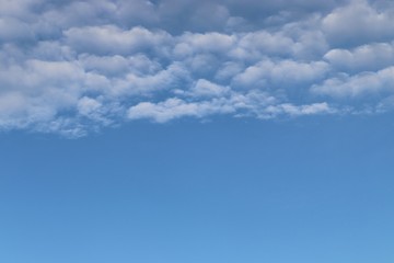 White clouds in blue sky background