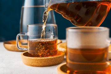 Alternative coffee brewing method,pure over,glass teapot on wooden tray with freshly brewed coffee
