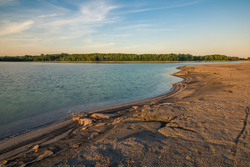 Azure lake called Osadnik Gajowka near Psary village, Poland