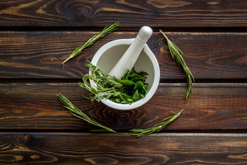 Store up medicinal herbs on wooden background top view