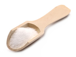 Salt in wooden spoon isolated on white