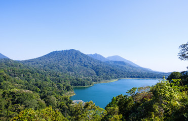 View of lake Buyan (Danau Buyan) from the top. Landscape with lake and mountain views. Bedugul, Buleleng, Bali, Indonesia.