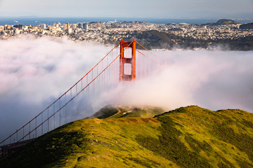 San Francisco Golden Gate Bridge Covered in Fog / Clouds