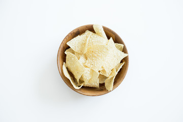 Chips with salsa and guacamole on white background