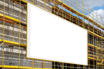 blank advertisement billboard on scaffolding / building facade -