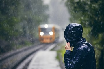 Man in heavy rain