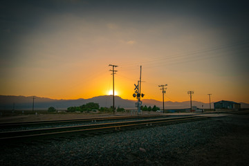 Fototapeta na wymiar sunset over railway station