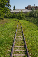 Narrow gauge railway in the park. Old children's railway