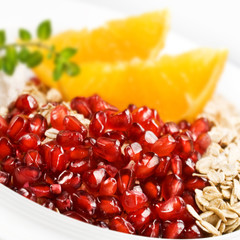 Pomegranate and oats close up