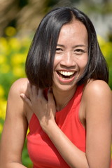 Young Filipina Woman And Laughter