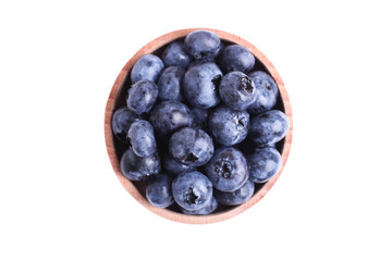 blueberry in wooden bowl