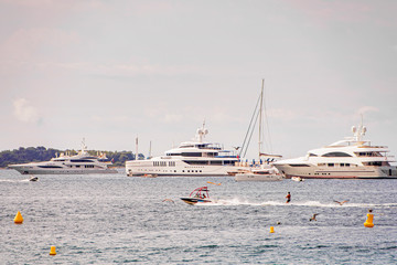 Sea bay marina with yachts and boats in Cannes