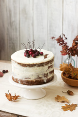 Apple cake with cream in autumn composition