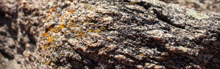 Old marble, some rocks, bokeh. Background