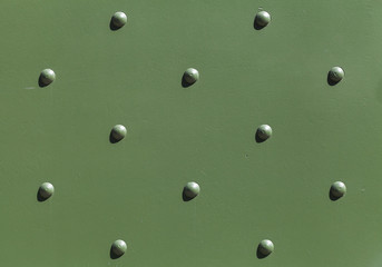 Military green industrial metal plate with rivets