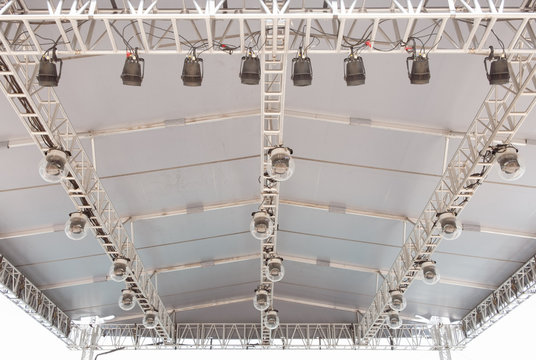 Detailed Covered Stage Light And Effect Scaffolding. Outdoor Stage Audio Visual Design And Detail. 