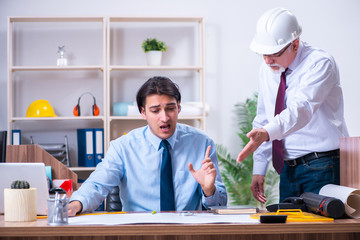 Two architects working on the project