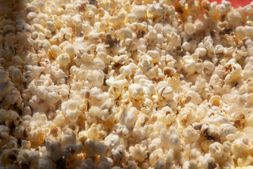 Popcorn on the holiday. Simple background grilled corn.