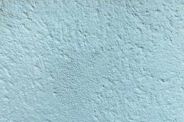 Light blue old painted wall background. Old texture.