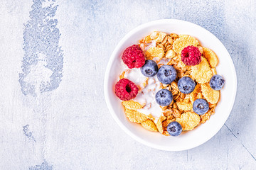 Healthy breakfast, muesli, cereal with fruit.