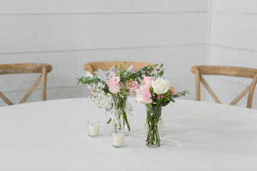 Fresh Flowers in Vase on Table, Wedding Floral Arrangment at Reception, Roses and Peonies in Glass Jars, White Background, Modern Barn Wedding