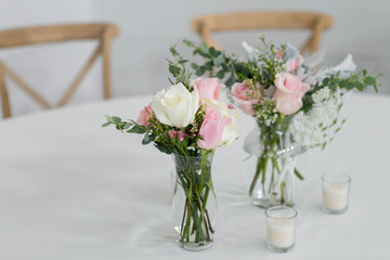 Fresh Flowers in Vase on Table, Wedding Floral Arrangment at Reception, Roses and Peonies in Glass Jars, White Background, Modern Barn Wedding