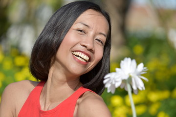 Happy Female Woman With A Flower