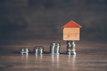 house model on the coins on the desk