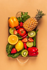 Fruits and vegetables rich in vitamin C in box.
