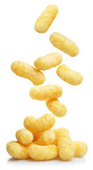 Falling delicious sweet corn sticks, isolated on white background