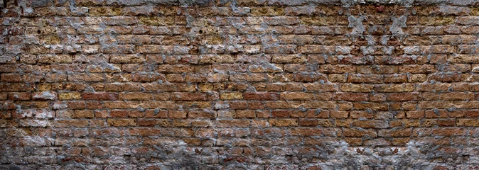 Grunge Hintergrund einer Mauer aus Ziegeln © alphaspirit