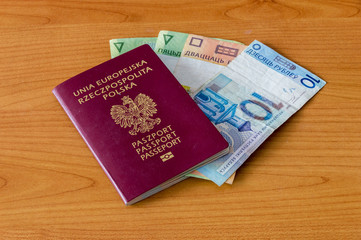 Fototapeta premium Polish biometric passport and Belarusian Currency.