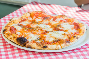 Pizza Margarita with mozzarella cheese.