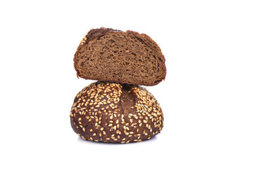 Malted bread with sesame isolated on white background. Sliced bread.