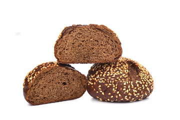 Malted bread with sesame isolated on white background. Sliced bread.