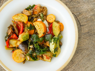 vegetable dish consisting of stewed eggplant zucchini sweet pepper tomato carrots onions and parsley