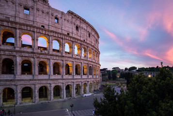 The ancient Colosseum in Rome at sunset